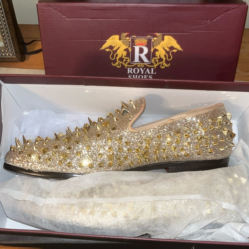 A Royal Gold Dress Glider loafer With Gold Spikes